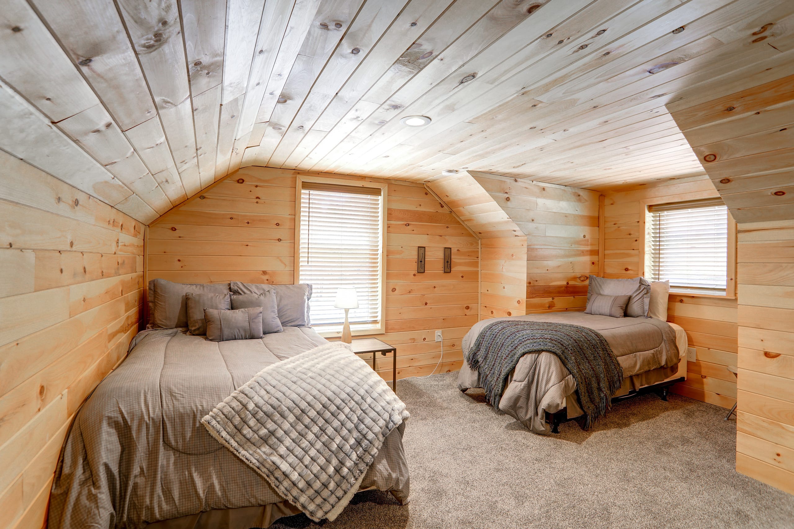 Bedroom 7 second sleeping nook with one full bed and one twin bed